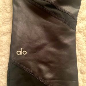 Alo size Medium yoga pants with faux leather and mesh detail
